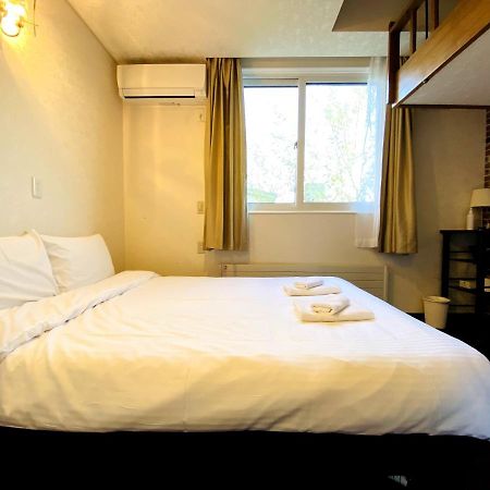 Petit Hotel Melon Furano Bagian luar foto
