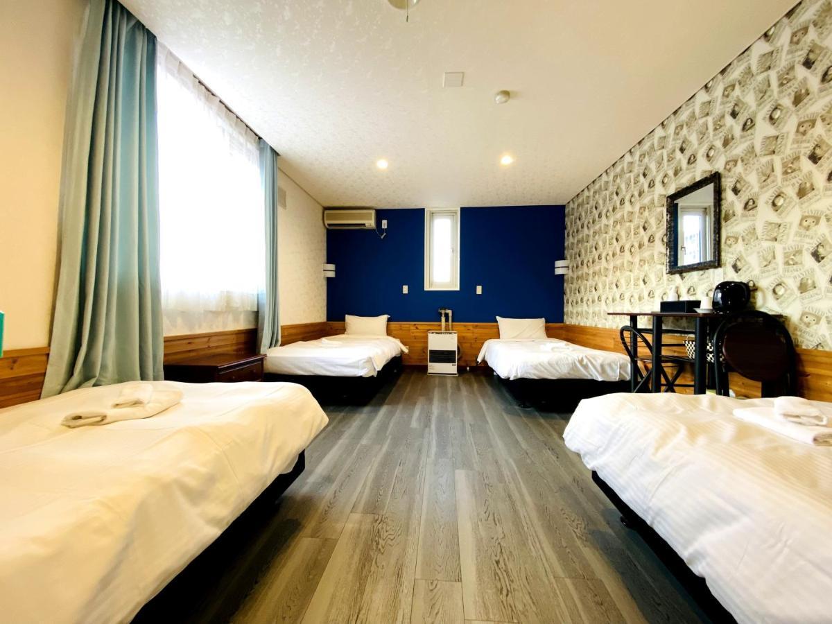Petit Hotel Melon Furano Bagian luar foto