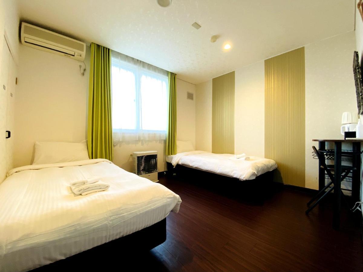 Petit Hotel Melon Furano Bagian luar foto