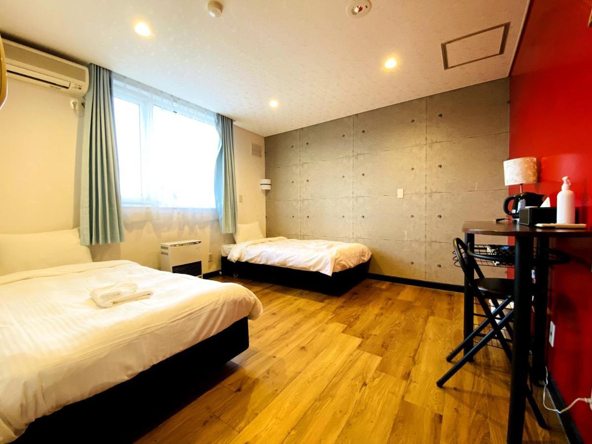 Petit Hotel Melon Furano Bagian luar foto
