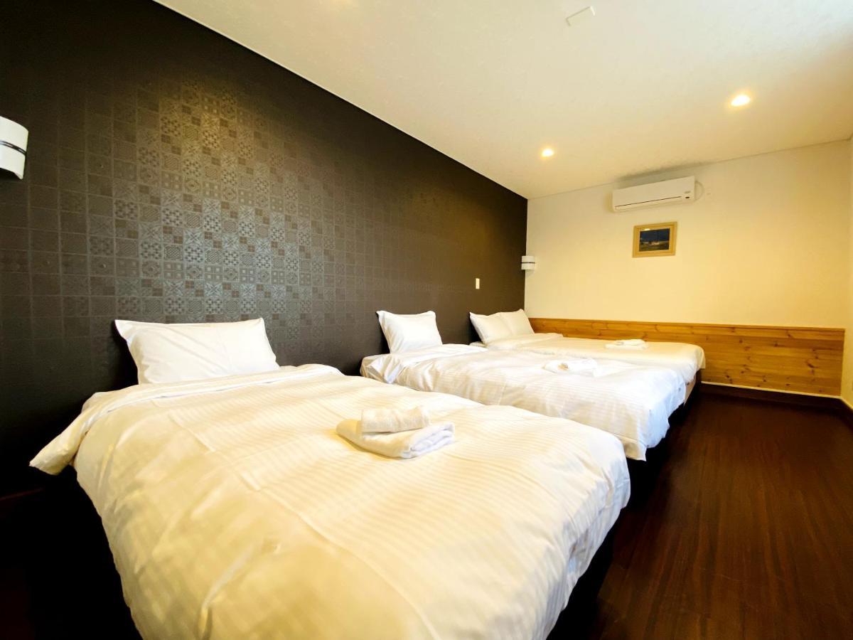 Petit Hotel Melon Furano Bagian luar foto