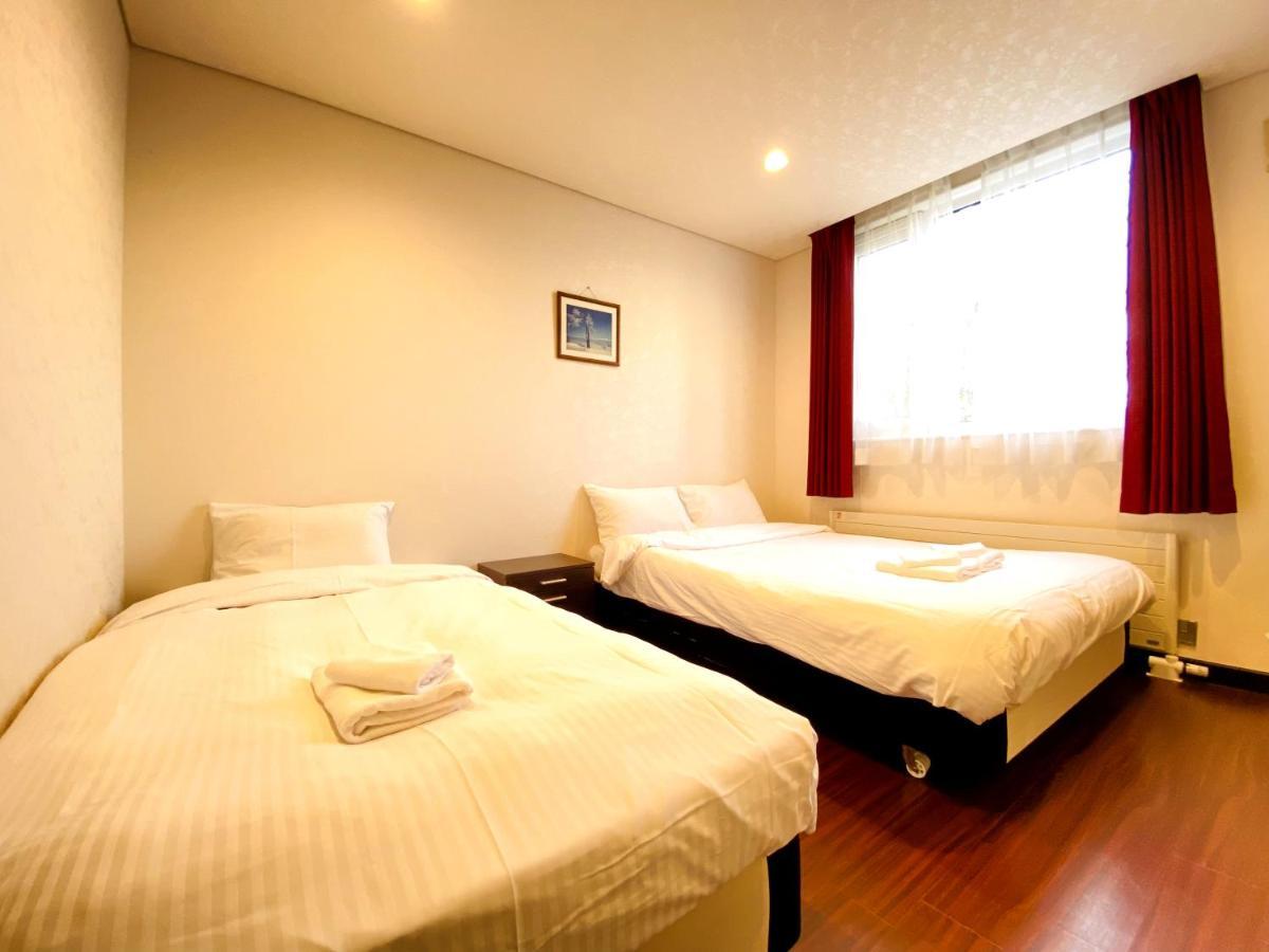 Petit Hotel Melon Furano Bagian luar foto