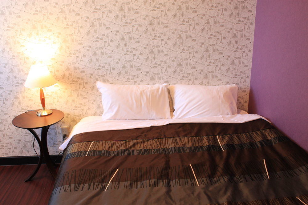 Petit Hotel Melon Furano Bagian luar foto
