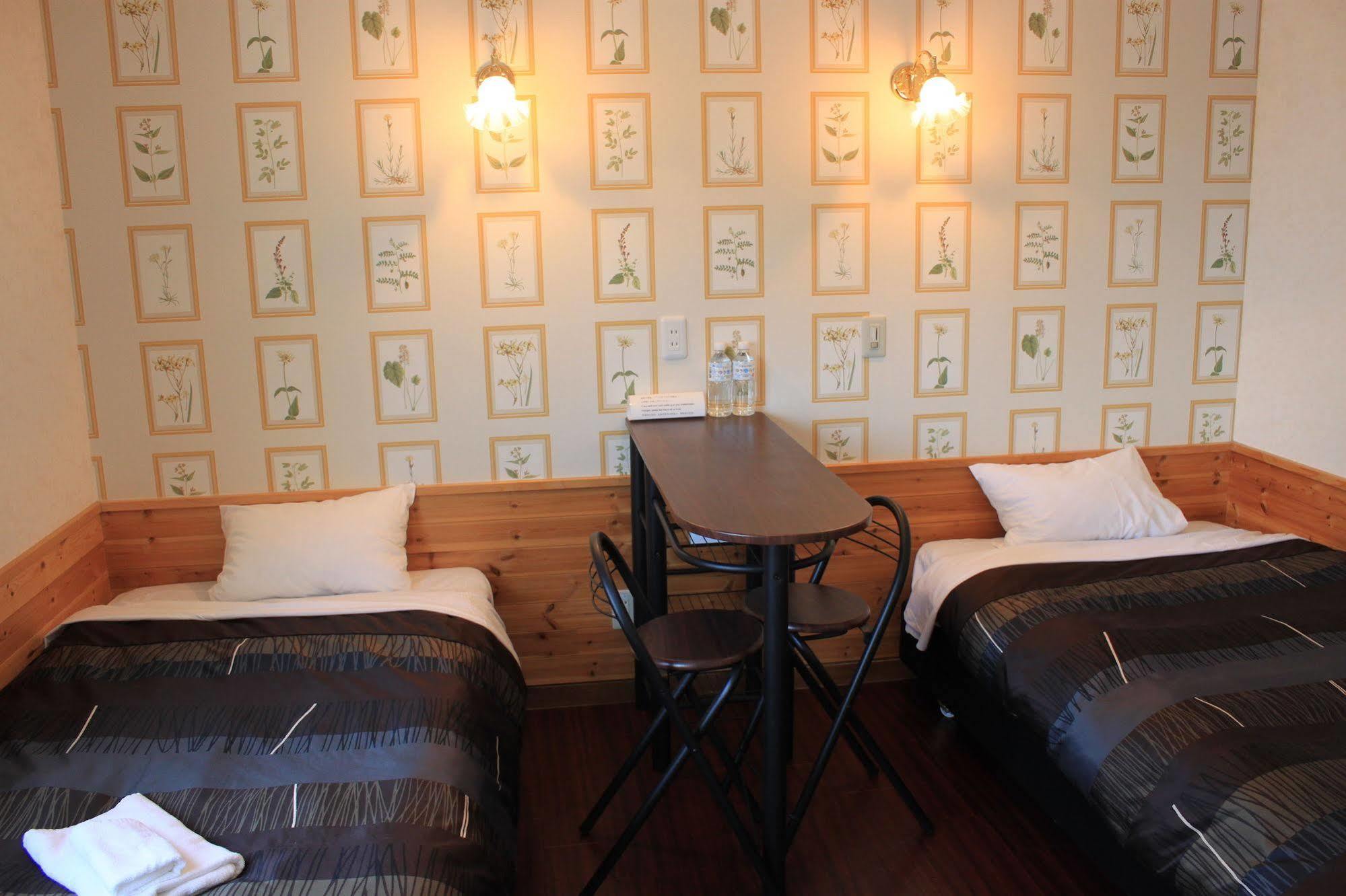 Petit Hotel Melon Furano Bagian luar foto